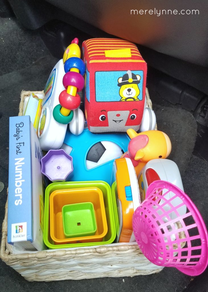 road trip with baby, road trip with kids, how to organize toys in the car, easy road trip with a baby